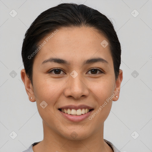 Joyful asian young-adult female with short  brown hair and brown eyes