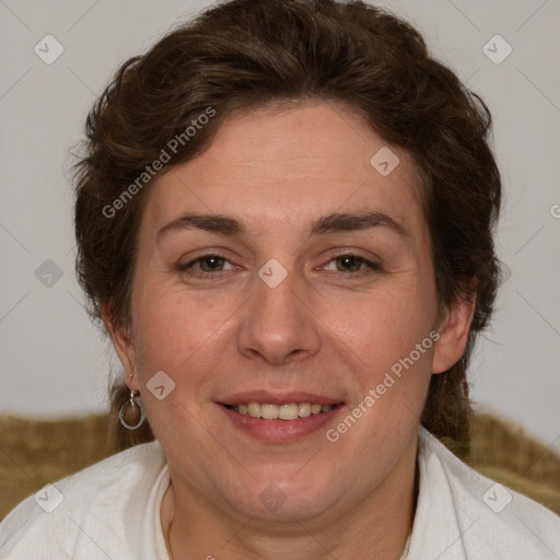 Joyful white adult female with short  brown hair and brown eyes