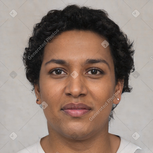 Joyful black young-adult female with short  brown hair and brown eyes