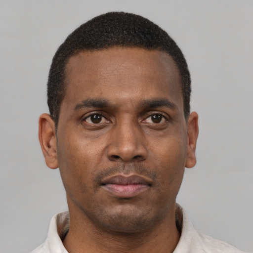 Neutral black young-adult male with short  brown hair and brown eyes