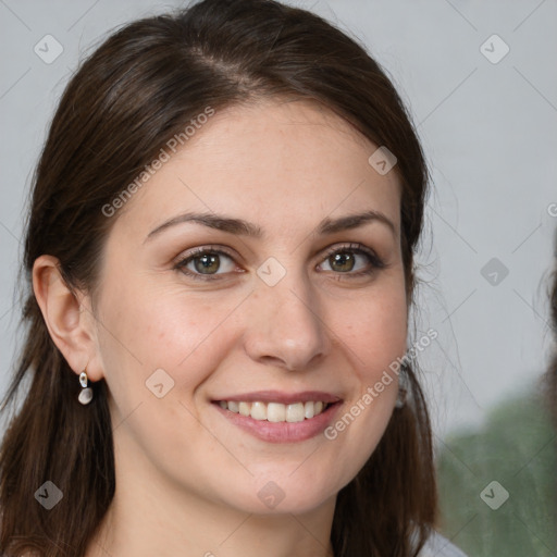 Joyful white young-adult female with long  brown hair and grey eyes