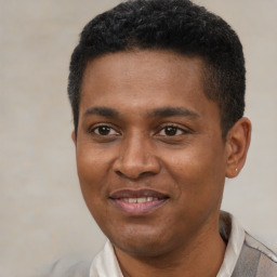 Joyful latino young-adult male with short  black hair and brown eyes