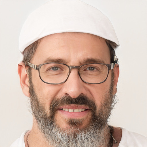 Joyful white middle-aged male with short  brown hair and brown eyes