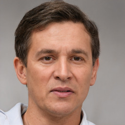 Neutral white adult male with short  brown hair and brown eyes