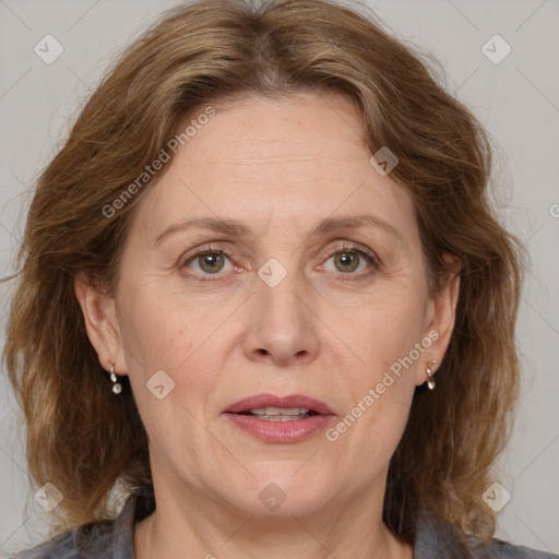 Joyful white adult female with medium  brown hair and grey eyes