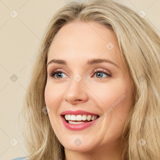 Joyful white young-adult female with long  brown hair and green eyes