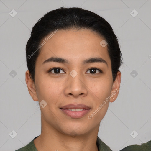 Joyful asian young-adult female with short  black hair and brown eyes