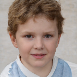 Joyful white child male with short  brown hair and brown eyes