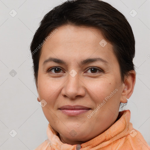 Joyful white adult female with short  brown hair and brown eyes