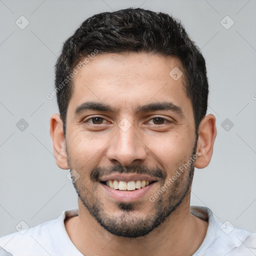 Joyful white young-adult male with short  brown hair and brown eyes