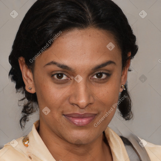 Joyful latino adult female with medium  brown hair and brown eyes