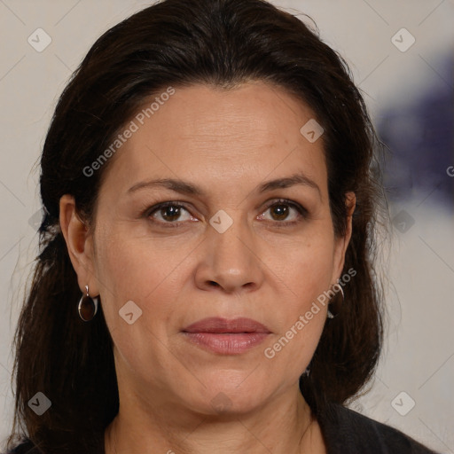 Joyful white adult female with medium  brown hair and brown eyes