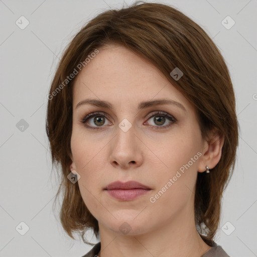 Neutral white young-adult female with medium  brown hair and green eyes