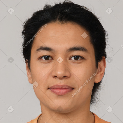 Joyful latino young-adult male with short  brown hair and brown eyes