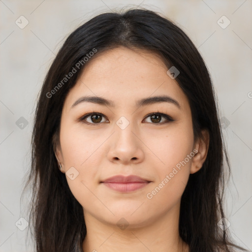 Joyful latino young-adult female with long  brown hair and brown eyes