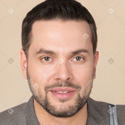 Joyful white young-adult male with short  brown hair and brown eyes