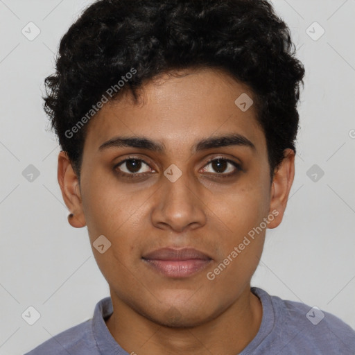 Joyful latino young-adult male with short  brown hair and brown eyes