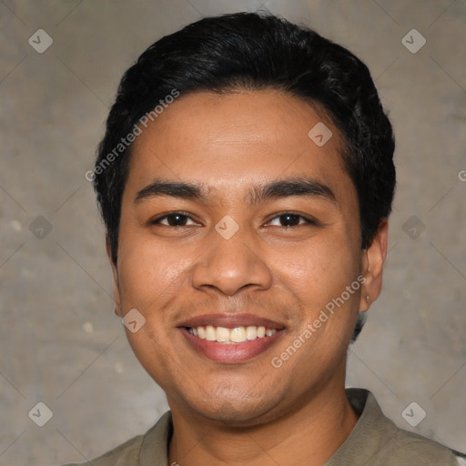 Joyful latino young-adult male with short  black hair and brown eyes