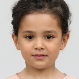 Joyful white child female with short  brown hair and brown eyes