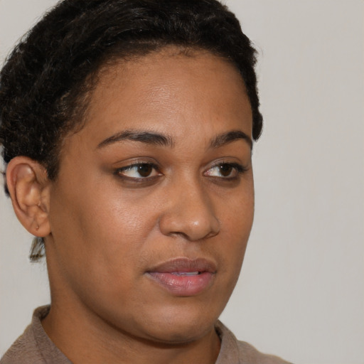 Neutral latino young-adult female with short  brown hair and brown eyes