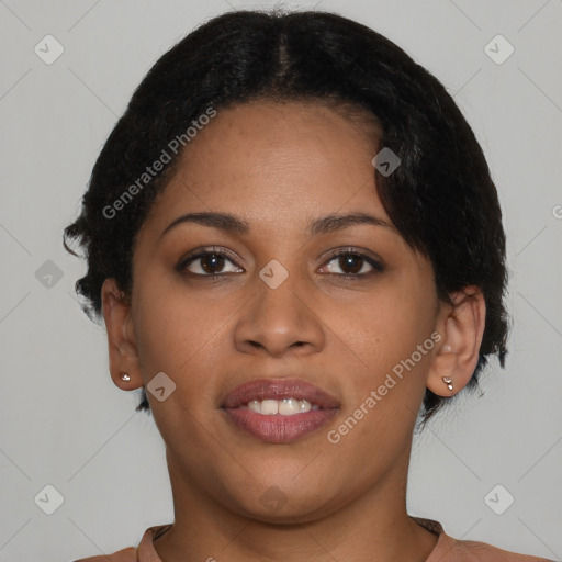 Joyful black young-adult female with short  brown hair and brown eyes