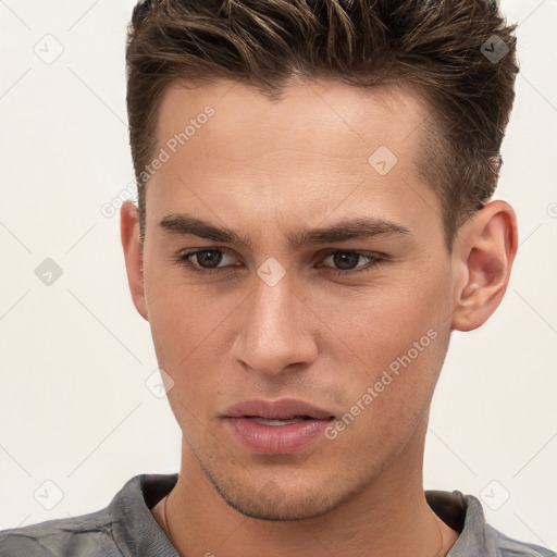 Neutral white young-adult male with short  brown hair and brown eyes