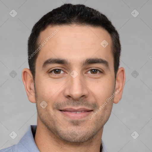 Joyful white young-adult male with short  brown hair and brown eyes