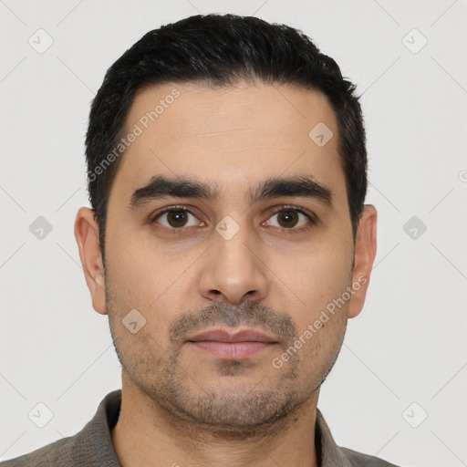 Neutral latino young-adult male with short  black hair and brown eyes
