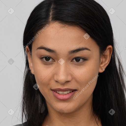 Joyful asian young-adult female with long  brown hair and brown eyes