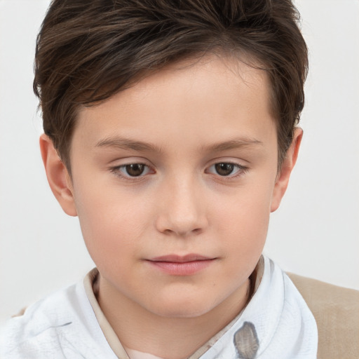 Joyful white child female with short  brown hair and brown eyes