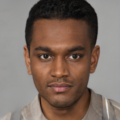 Neutral latino young-adult male with short  brown hair and brown eyes