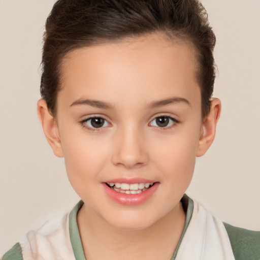 Joyful white child female with short  brown hair and brown eyes