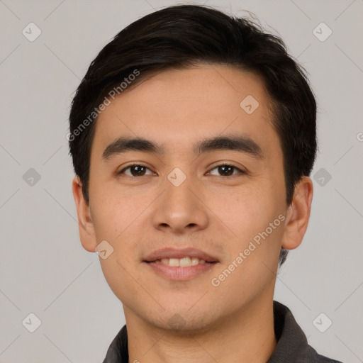 Joyful white young-adult male with short  black hair and brown eyes