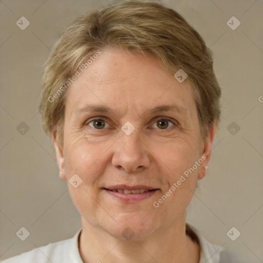 Joyful white adult female with short  brown hair and brown eyes