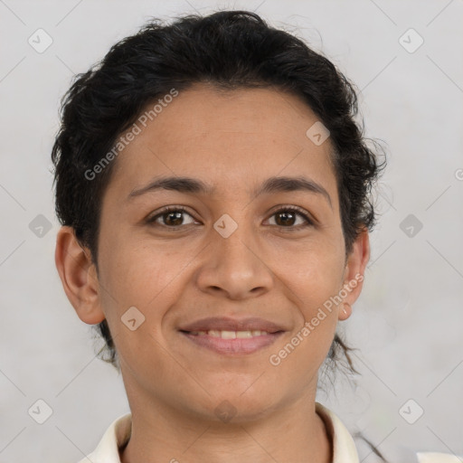 Joyful latino young-adult female with short  brown hair and brown eyes