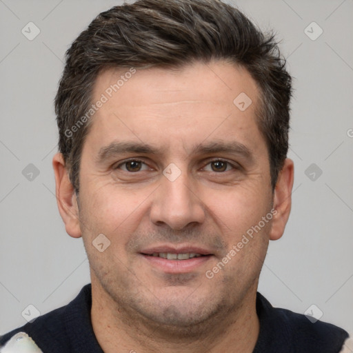 Joyful white adult male with short  brown hair and brown eyes