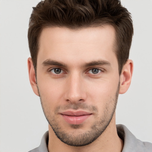 Neutral white young-adult male with short  brown hair and grey eyes