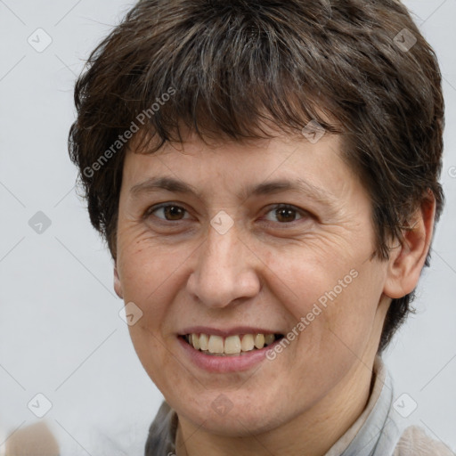 Joyful white adult female with short  brown hair and brown eyes