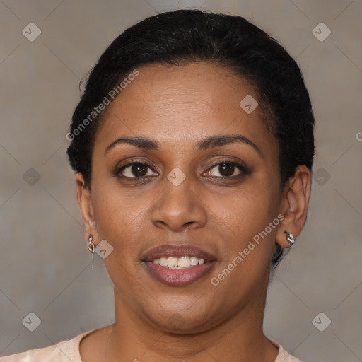 Joyful black young-adult female with short  brown hair and brown eyes