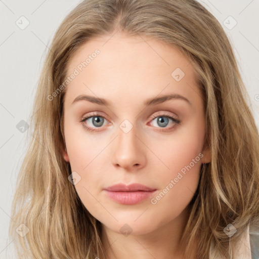 Neutral white young-adult female with long  brown hair and blue eyes