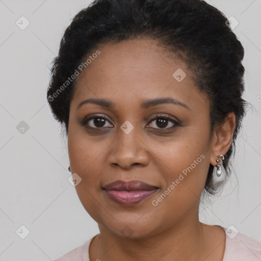 Joyful black young-adult female with medium  black hair and brown eyes