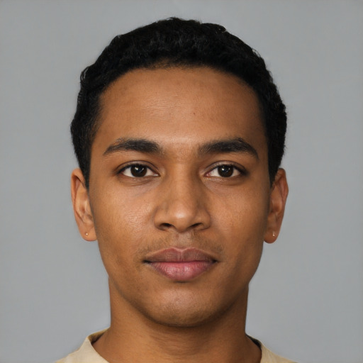 Neutral black young-adult male with short  black hair and brown eyes