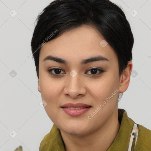 Joyful asian young-adult female with short  black hair and brown eyes