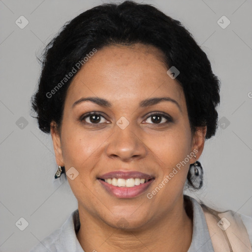 Joyful latino adult female with short  brown hair and brown eyes