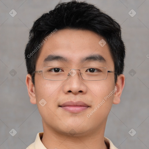 Joyful asian young-adult male with short  brown hair and brown eyes