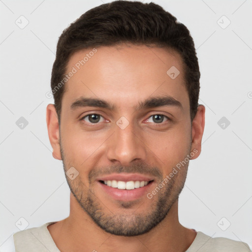 Joyful white young-adult male with short  brown hair and brown eyes