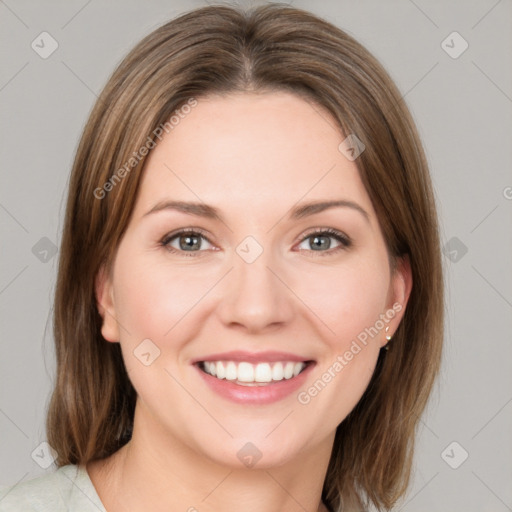 Joyful white young-adult female with medium  brown hair and green eyes