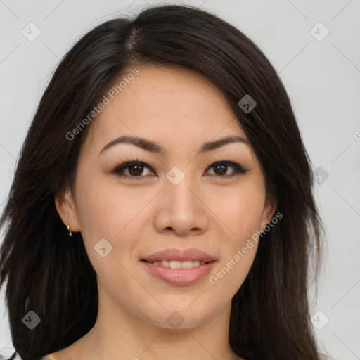 Joyful asian young-adult female with long  brown hair and brown eyes