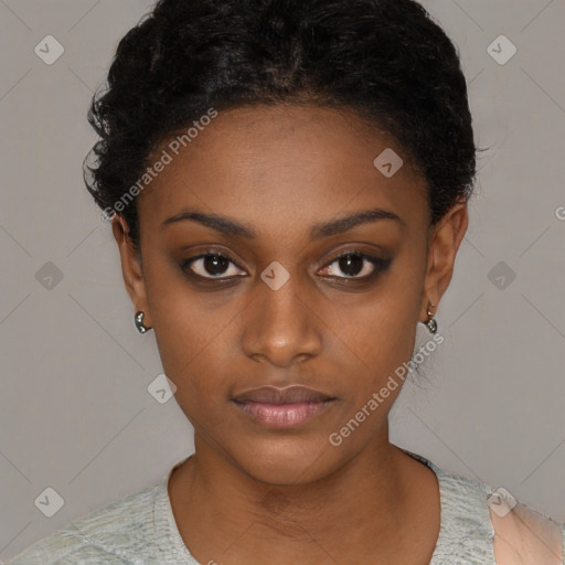 Neutral black young-adult female with short  black hair and brown eyes