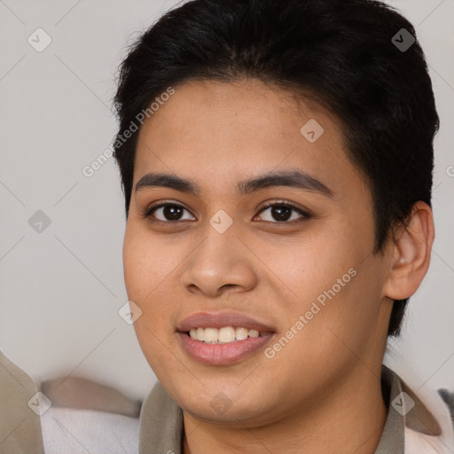 Joyful asian young-adult female with short  brown hair and brown eyes